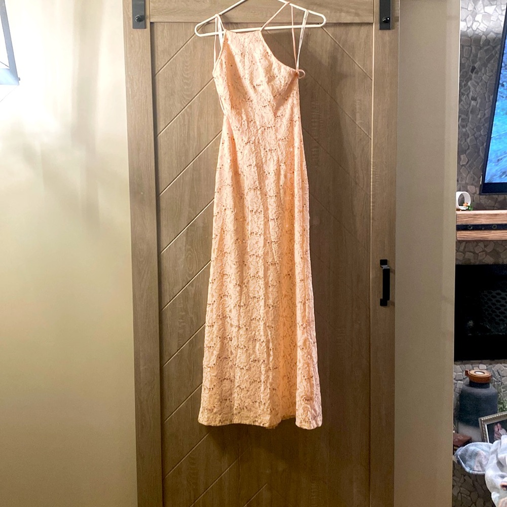 Light pink, maxi, and a corset back.
